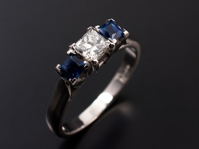 Ladies Diamond and Blue Sapphire Trilogy Engagement Ring, Platinum 4 Claw Set Design, Princess Cut Diamond 0.40ct, G Colour, VS1 Clarity, Square Cut Sapphires 2x 0.25ct