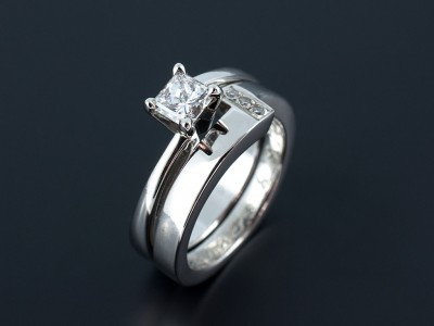 Princess Cut 0.51ct E SI2 Platinum Engagement Ring with Fitted Wedding Ring Comprising Round Brilliant Pave Set Diamonds.