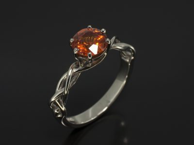 Round Brilliant Cut Orange Sapphire, 1.20ct with a Six Claw Setting In a Palladium Lattice Design