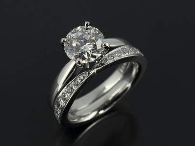 Pave set diamond bespoke ladies wedding ring, fitted with round brilliant cut 1.51ct diamond solitaire engagement ring