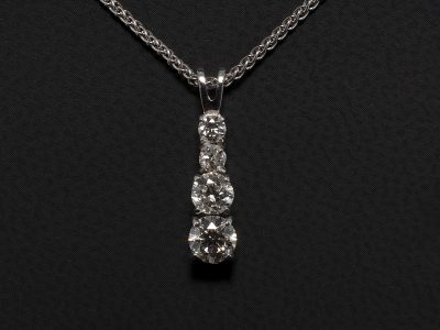 9kt White Gold Claw Set Graduated Diamond Drop Pendant, Round Brilliant Cut Diamonds 0.72 ct (4), Split Bale Detail on Spiga Chain