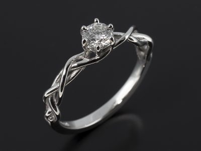 Round Brilliant 0.40ct G Colour SI1 Clarity EXEXEX in a 6 Claw Setting with Twist Lattice Band in Platinum.