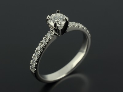 Round Brilliant Cut 0.43ct F Colour VS2 Clarity with Diamond Claw Set Shoulders in a 4 Claw Palladium Setting.