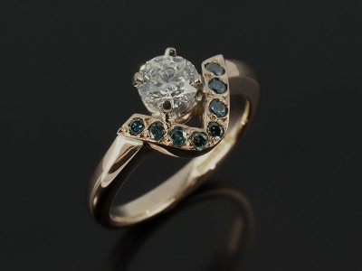 Round Brilliant 0.51ct D Colour SI1 Clarity EXEXEX in a 18kt Rose Gold Design with Pavé Set Round Blue Diamonds