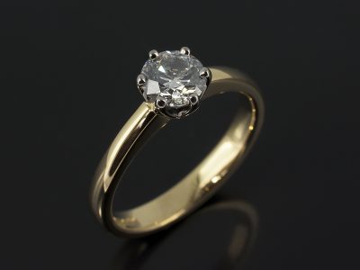 Round Brilliant 0.63ct D Colour SI1 Clarity EXEXEX in a 6 Claw White and Yellow Gold Solitaire Setting.