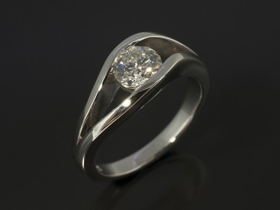 Round Brilliant 0.63ct G Colour SI Clarity in a Platinum Tension Set Twist Setting.