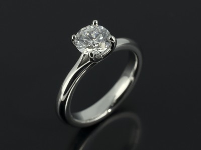 Round Brilliant 0.78ct D Colour VS2 Clarity Triple Excellent Grade in a 4 Claw Platinum Intersecting Twist Design.