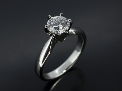 Round Brilliant 0.90ct D Colour SI1 Clarity in a 6 Claw Platinum Solitaire Design.