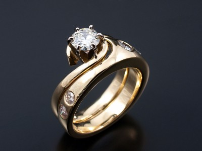 Round Brilliant 0.51ct F SI1 in a 18kt Yellow Gold Twist Setting with Fitted Secret Set Diamond Wedding Ring