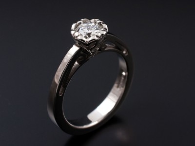 Round Brilliant 0.54ct F SI2 Ex Cut Grade in a Hand Made Palladium Setting with Gapped Detailed Shoulders
