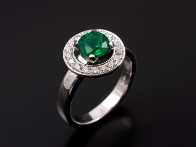 Round Brilliant Cut Emerald 0.83ct with Pave Set Diamond Halo in 18kt White Gold