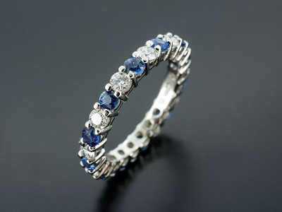 Round Brilliant and Sapphire Full Platinum Eternity Ring.