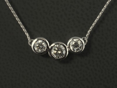 18kt White Gold Rub over Set Trilogy Diamond Pendant, Round Brilliant Cut Diamonds on an 18kt White Gold Spiga Chain