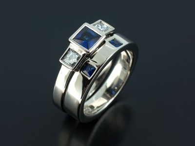 Princess Cut Sapphire 0.46ct with Princess Cut Diamonds 0.37ct Total with Fitted Wedding Ring with 2 x Princess Cut Sapphires 0.15ct in a Palladium Rub Over Contemporary Design.