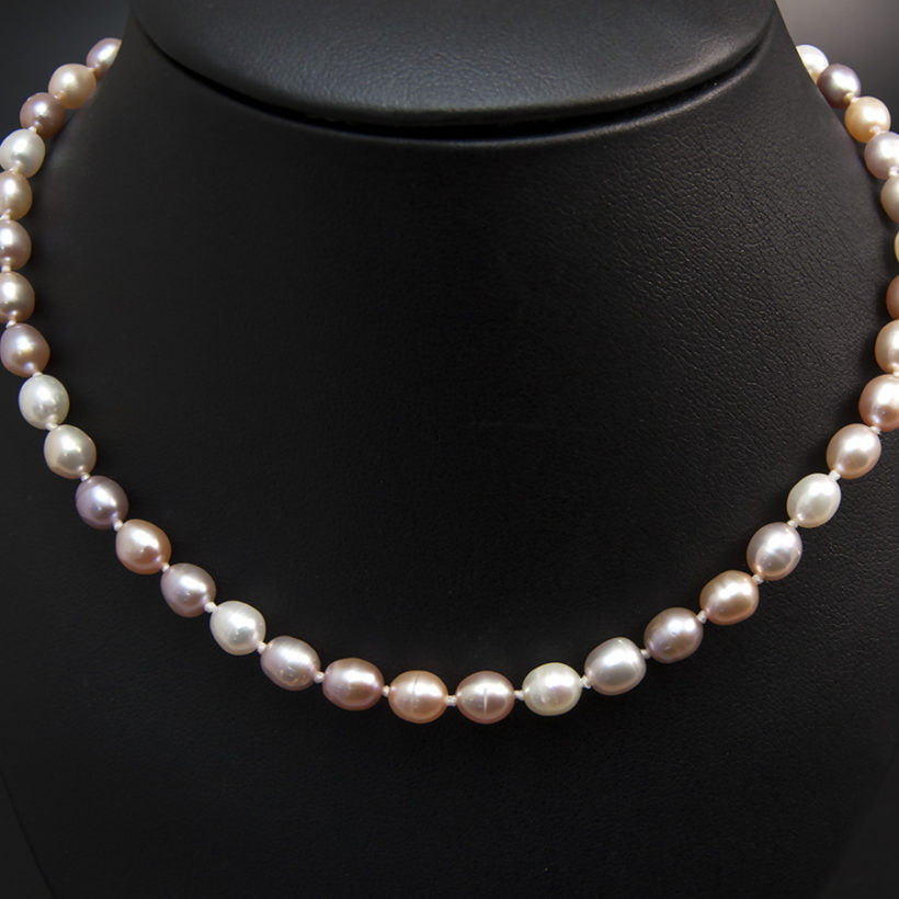 Multi Tone Seed Shape Freshwater Pearl Necklace 5x6mm With A Silver Oval Magnetic Clasp