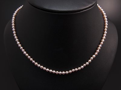 Peach Round Freshwater Pearl Necklace With A Silver Magnetic Clasp