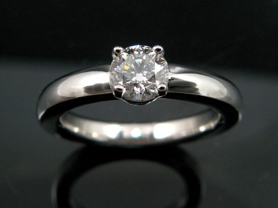 White Gold 18kt Halo Band Engagement Ring in a 4 Claw Setting with a 0.50ct G VS2 Round Brilliant Diamond