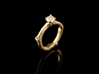 Yellow Gold 18kt Twig Engagement Ring with a 0.63ct F SI1 and 3 x 0.01ct F VS Round Brilliant Diamonds