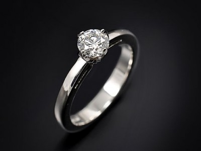 Platinum 4 Claw Compass Set Engagement Ring with a 0.46ct F VS2 Round Brilliant Diamond