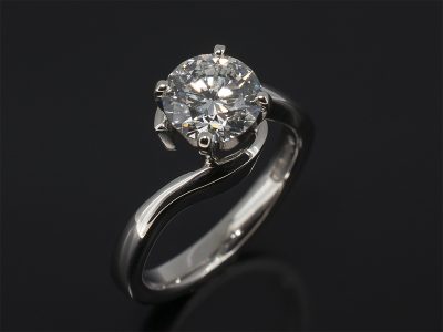 Round Brilliant Cut Diamond. 1.23ct, E Colour, VS2 Clarity Claw Set in Platinum in a Twist Design