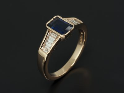 18kt Red Gold Rub-over Set Emerald Sapphire 0.95ct & Channel Set Baguette Diamond 0.61ct (6) Ring Design