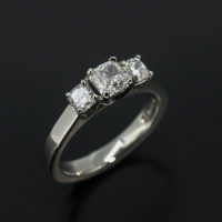Trilogy Cushion Cut Diamond Design Platinum Engagement Ring