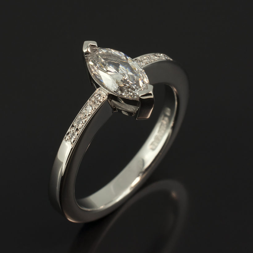 Platinum Claw and Pavé Set Engagement Ring with Marquise Cut 0.70ct D Colour SI1 Clarity