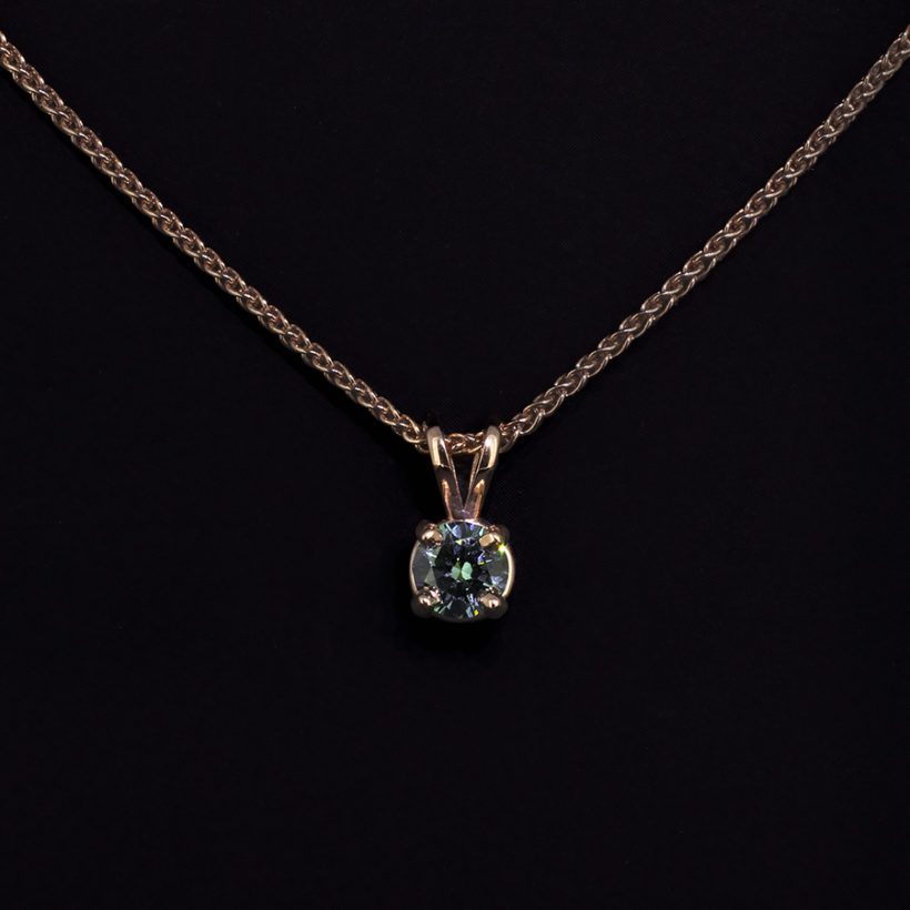 9kt Rose Gold Claw Set Pendant. Round Brilliant Cut Blue Diamond, 0.37ct, Spiga Chain