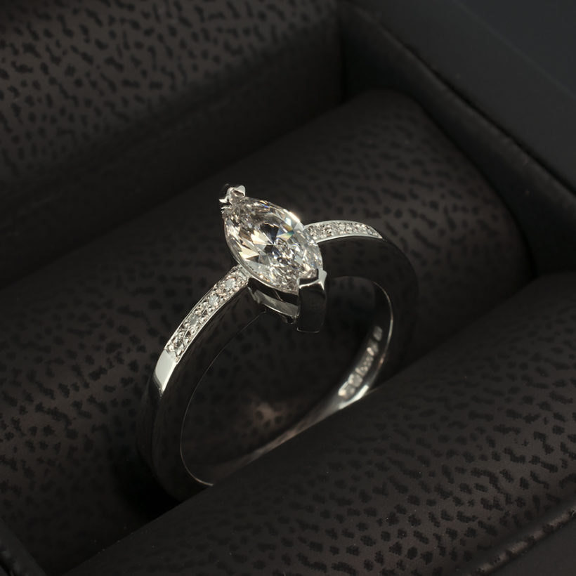 Platinum Claw and Pavé Set Engagement Ring with Marquise Cut 0.70ct D Colour SI1 Clarity
