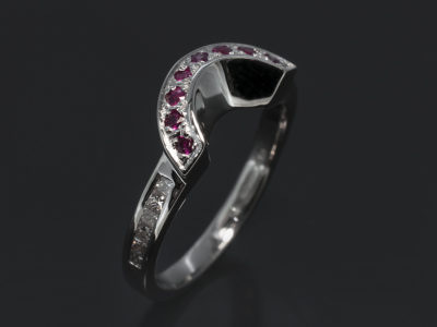 18kt White Gold Fitted Pavé & Channel Set Design. Round Brilliant Cut Rubies, Approximately 0.16ct (8). Princess Cut Diamonds, 0.18ct (12), F G Colour, SI Clarity.