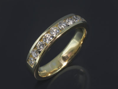 18kt Yellow Gold Channel Set Design. Round Brilliant Cut Diamonds, 1.00ct (10). HSI