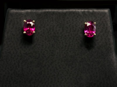 18kt Yellow Gold Four Claw Set Ruby Stud Earrings, Oval Cut Rubies 0.63ct Total