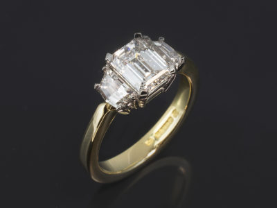 Ladies Trilogy Diamond Engagement Ring, 18kt Yellow Gold and Platinum Claw Set Design, Emerald Cut Diamond 1.00ct, E Colour, SI1 Clarity, Cadillac Cut Diamond Side Stones 0.53ct (2), F Colour, VS Clarity Minimum