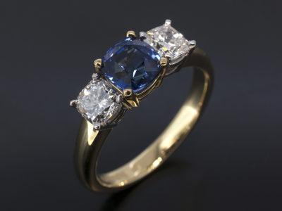 18kt Yellow Gold & Platinum Trilogy Design Cushion Cut Sapphire, 1.35ct Cushion Cut Diamonds, 0.83ct (2), F Colour, SI Clarity Minimum