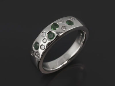 Ladies Diamond and Emerald Eternity Ring, 9kt White Gold Scattered Secret Set Design, Round Brilliant Cut Diamonds 0.16ct (8), Round Brilliant Cut Emeralds, 2.4mm -2.7mm (4)