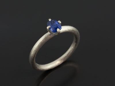 Cushion Cut Sapphire 0.62ct in a Platinum 4 Claw NSEW Setting with a Brushed Finish