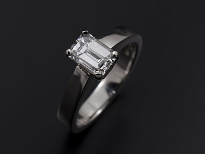 Ladies Solitaire Diamond Engagement Ring, Platinum 4 Claw Set Design, Emerald Cut Diamond 0.97ct, E Colour, VS2 Clarity