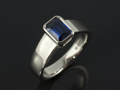 Emerald Cut Sapphire 0.97ct in Rub over Set Palladium Ring