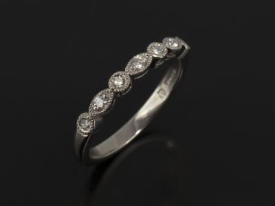 Palladium Pavè Set Round Brilliant Cut Diamond Ring with Filigree Leaf Detail