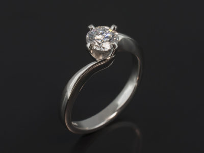 Ladies Solitaire Diamond Engagement Ring, Platinum 4 Claw Compass Set Twist Design, Round Brilliant Cut Diamond 0.54ct, D Colour, SI1 Clarity