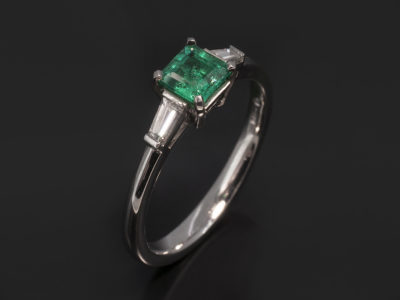 Platinum Claw Set Design Ring, Asscher Cut Emerald, 0.47ct. Tapered Baguette Cut Diamonds, 0.21ct (2), F Colour, VS Clarity