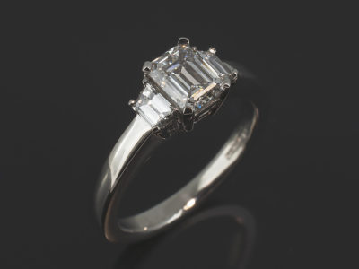 Ladies Trilogy Diamond Engagement Ring, Platinum Claw Set Design, Emerald Cut Diamond 1.00ct, VS2 Clarity, Trapezium Cut Diamond Side Stones 0.43ct (2), F Colour, VS Clarity Minimum