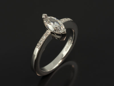 Ladies Diamond Engagement Ring, Platinum Claw and Pavé Set Design, Marquise Cut Diamond Centre Stone 0.70ct, D Colour, SI1 Clarity, Round Brilliant Cut Diamond Pavé Set Shoulder