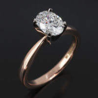 Platinum Four Claw Set & 18kt Red Gold Solitaire Design. Oval Cut Diamond, 1.04ct, D Colour, SI1 Clarity. Excellent Polish, Excellent Symmetry, Nil Fluorescence.