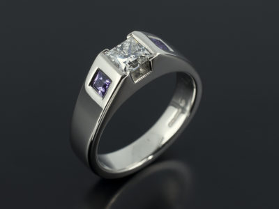 Ladies Diamond and Purple Sapphire Engagement Ring, Palladium Tension and Rub over Set Design, Princess Cut Diamond Centre Stone 0.54ct with Purple Sapphire Square Cut Side Stones