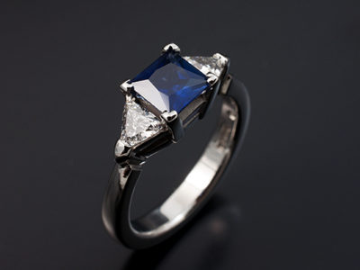 Princess Cut Sapphire and Trilliant Cut Side Diamonds