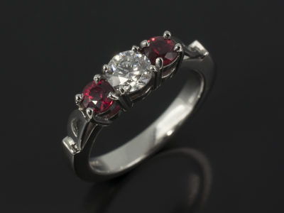Trilogy Dress Ring with Round Brilliant Cut Diamond 0.4ct D Colour SI2 EXEXEX and Round Brilliant Cut Blood Sapphire 0.4ct Side Stones