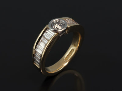 Round Billiant Cut 0.30ct F Colour VS2 Clarity EXEXEX and Baguette Cut Diamonds 0.88ct Total in a Platinum Rub Over and 18kt Yellow Gold Channel Set Design