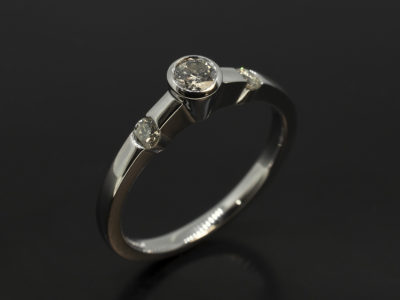 Ladies Contemporary Trilogy Diamond Engagement Ring, Platinum Rub over Set Design, Round Brilliant Cut Diamonds 0.21ct, 2x 0.14ct