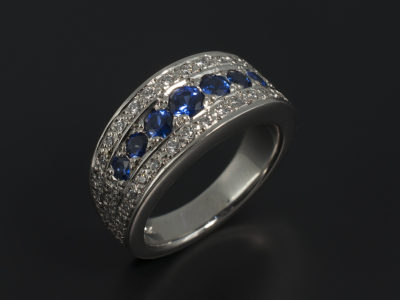 Brilliant Round Cut Sapphire 0.71ct and Diamonds (40) Palladium Eternity Ring Tapered